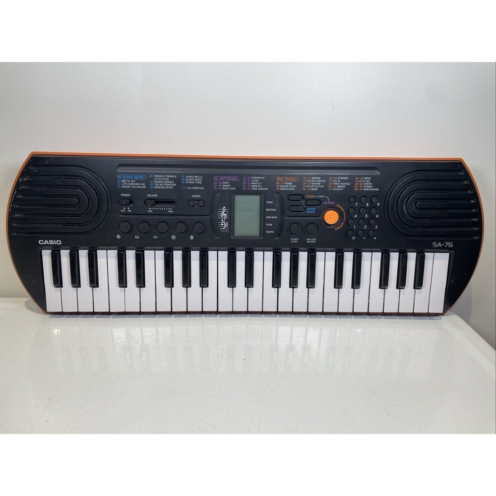 Casio SA-76 44-Key Mini Personal Keyboard Black Orange Digital Piano Portable